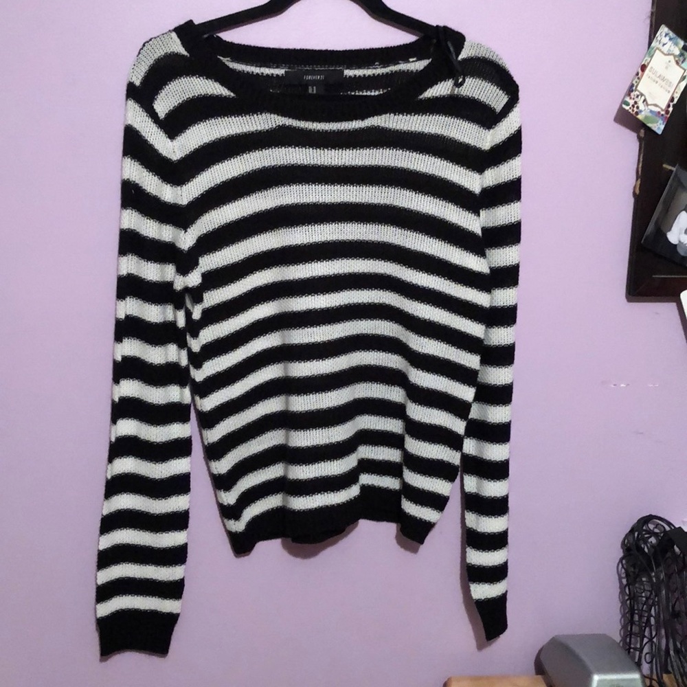 Black and white striped sweater size MEDIUM